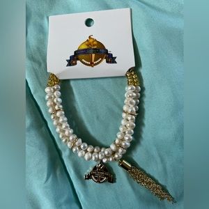 Sigma Gamma Rho Sorority, Incorporated Centennial Pearl Bracelet.